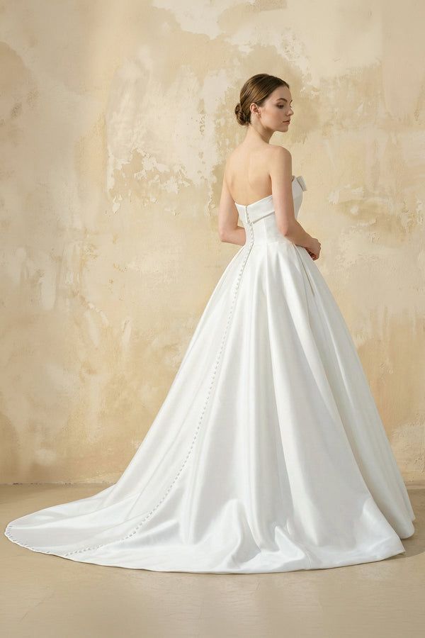 Strapless Satin Ball Gown With Bow in White - KISS BRIDAL Wedding Dresses